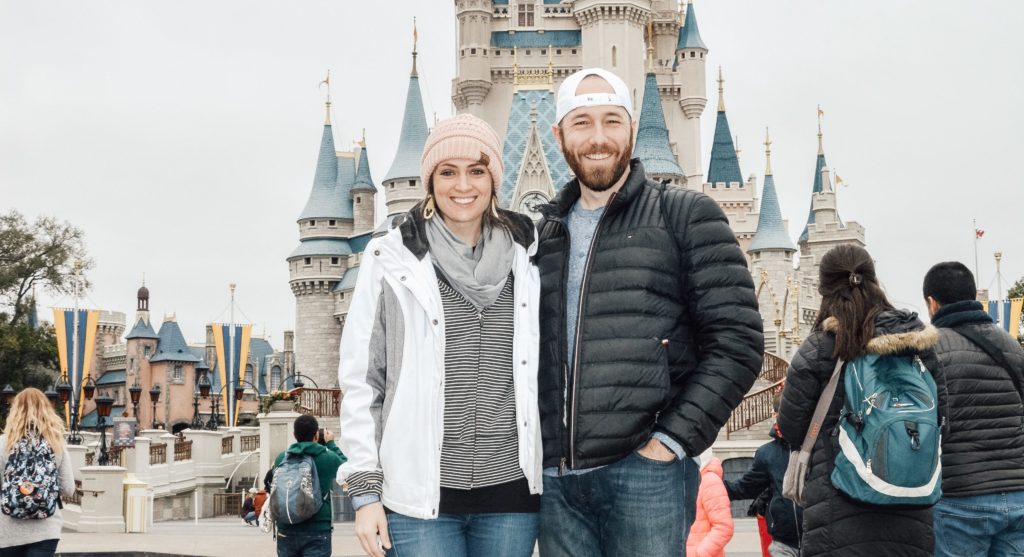 Margy and Kyle at Disney World Magic Kingdom in front of Cinderella Castle