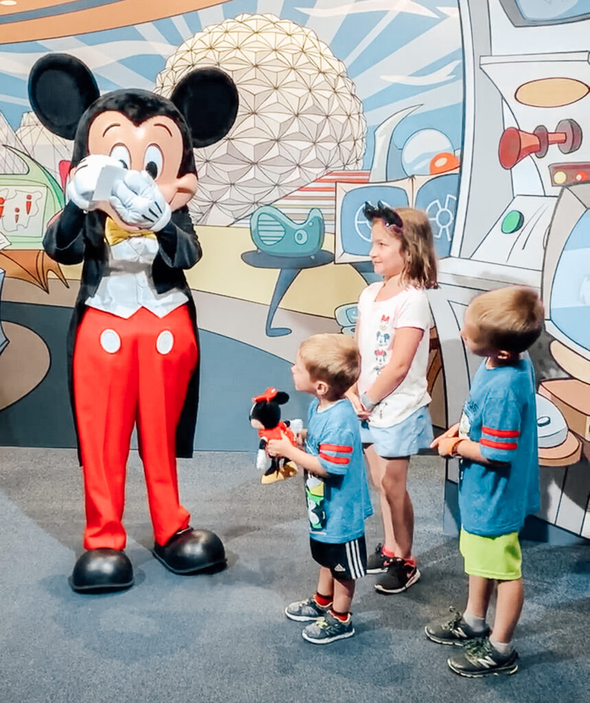 Mickey Mouse signing autograph for kids