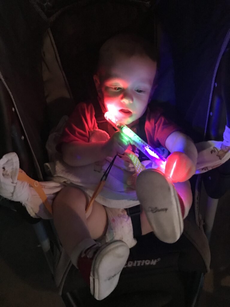 baby with glow stick